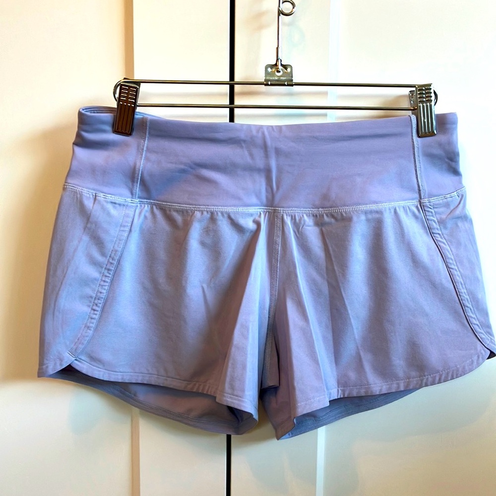Lululemon Speed up shorts mid rise, 4” inseam, size 4.